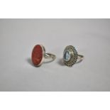 Two Silver Rings, One with Polished Stone, One with Indian Decoration, Both Stamped 925