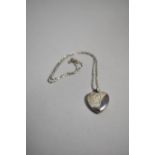 A Silver Love Heart Locket on Silver Chain