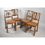 A Set of Four Mid 20th Oak Framed Dining Chairs