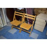 Two Vintage Wooden Folding Chairs