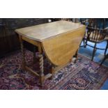 An Edwardian Oak Barley Twist Gate Legged Dining Table, 104cm wide