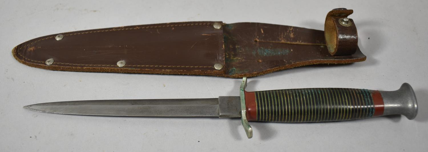 A WWII Commando Dagger by Fagan and Son., Sheffield Together with Leather Scabbard