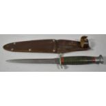 A WWII Commando Dagger by Fagan and Son., Sheffield Together with Leather Scabbard