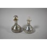 A Pair of Sterling Silver Overlaid Scent Bottles, 9cm high