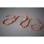 A String of Graduated Coral Beads, 90cm Long