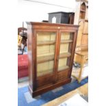 An Edwardian Walnut Glazed Bookcase, 113cm wide