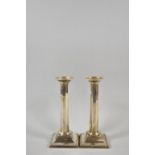 A Pair of Silver Candlesticks on Square Bases of Octagonal Column Form, 23cm high