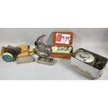 A Collection of Vintage Curios to Include Sirram Camping Stove in Tin, Vintage Electric Iron, Gas