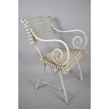 A Nice Quality Victorian Wrought Iron Garden Chair with Claw Feet and Scrolled Arms