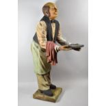 A Large Novelty Figural Dumb Waiter, Arm Has Been Glued, 95cm High