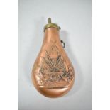 A Brass Mounted Copper Powder Flask with Embossed Decoration Depicting American Flags, Cannons and