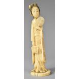 A Late 19th Century Carved Japanese Ivory Okimono Depicting Maiden with Fan, 19.5cm high