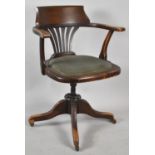 An Edwardian Swivel Office Armchair, In Need of Some Attention