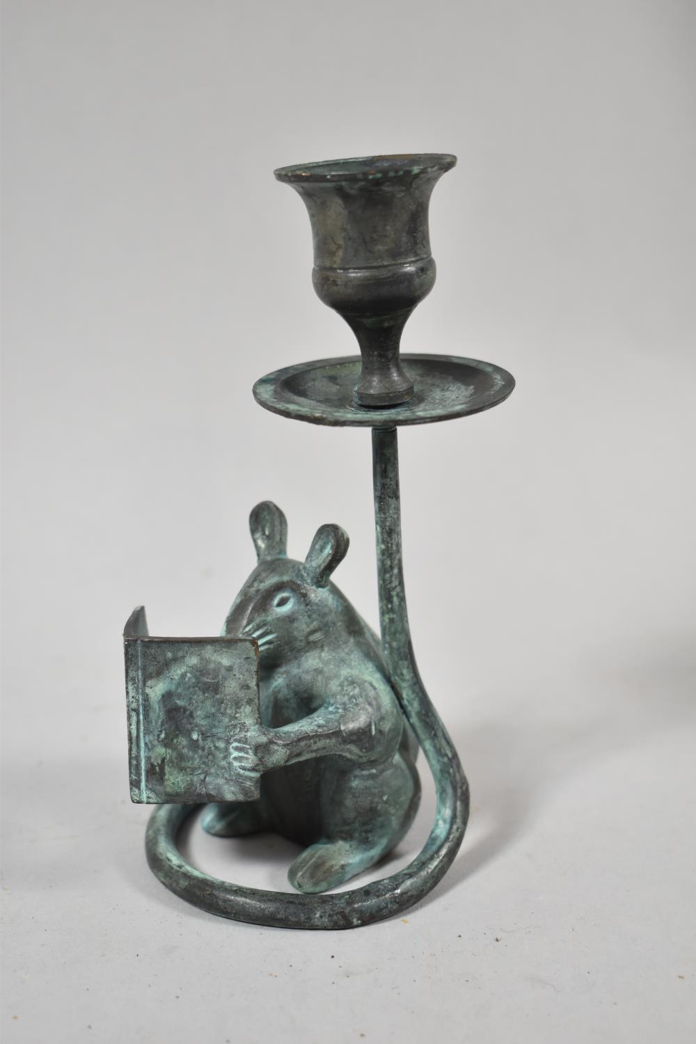 A Patinated Metal Novelty Candle Stick in the Form of a Seated Mouse Reading Book, 14cm high