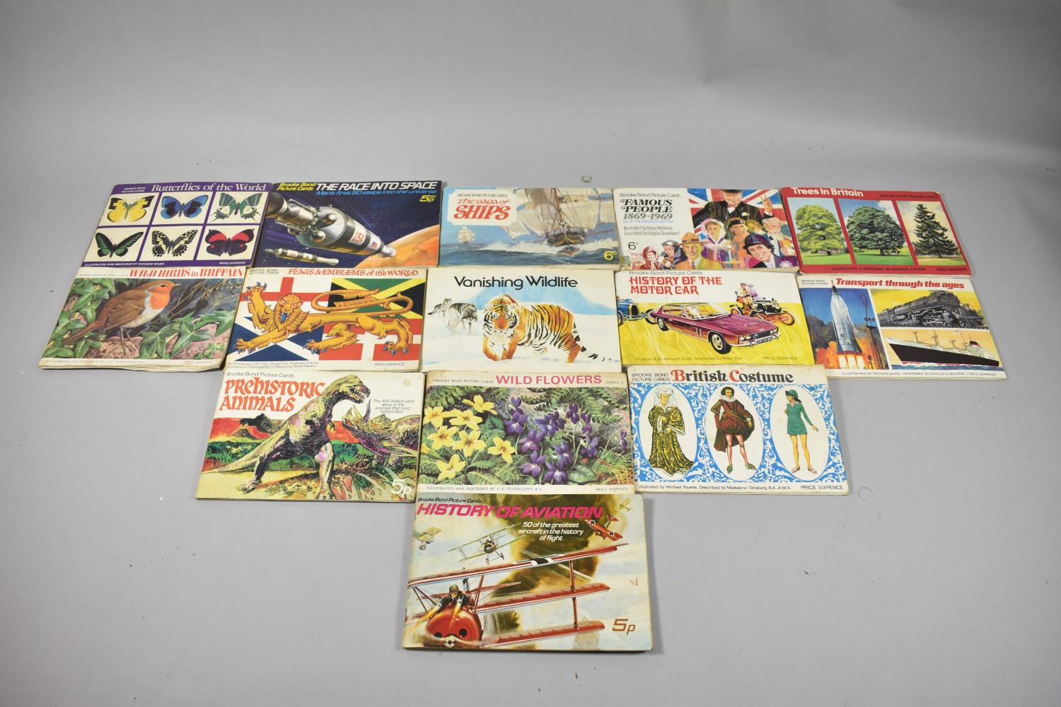 A Collection of Fourteen Tea Card Albums and Contents