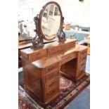A Late Victorian/Edwardian Dressing Table with Raised Plinth Having Three Jewel Drawers and Scrolled