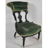 A Late Victorian/Edwardian Ebonised Framed Ladies Nursing Chair with Buttoned Back Rest