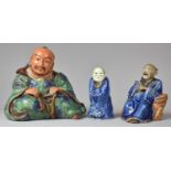 A Novelty Oriental Glazed Terracotta Tobacco Pot in the Form of a Seated Gent, Impressed Seal Mark