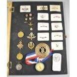 A Table Top Bijouterie Case Containing Various Enamel Badges, Brooches, Cufflinks, Together with RAF