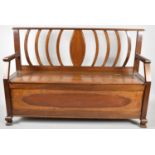 A 20th Century Mahogany Settle with Hinged Seat and Pierced Back, 52cm wide