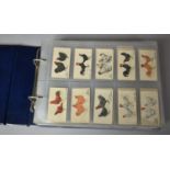 A Ring Binder Containing Various Sets of Cigarette Cards