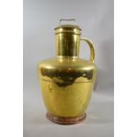 A Large Brass Ewer of Circular Tapering Form with Copper Base, 48cm High