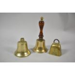 A Small Brass Handbell, a Brass Servants Bell and a Souvenir Loen Norge Miniature Cow Bell