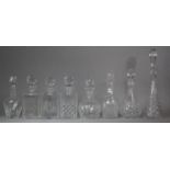 A Collection of Eight Various Cut Glass Decanters to include Edinburgh Crystal Etc