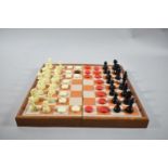 A Magnetic Combination Chess and Draughts Set, Black Queen Missing, in Folding Box
