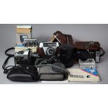 A Collection of Vintage Cameras and Lenses to Include Yashica-E in Leather Case, Yashica Telephoto