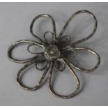 A Silver Wire Work Brooch in the Form of a Flower