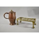 A Late 19th Century Pierced Brass Rectangular Trivet with Claw Feet Together with a Copper Arts