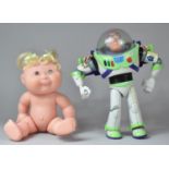 A Buzz Lightyear Toy and a Mattel Doll