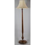 An Edwardian Oak Standard Lamp On Circular Base with Tapering Supports