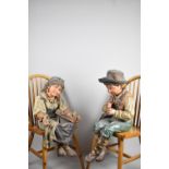 A Pair of Large Bretby Plaster Figures of Seated Children, The Boy Playing Instrument (Missing)