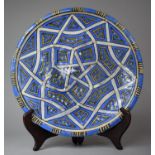 A North African Glazed Stoneware Dish with Islamic Decoration, 28cm diameter, Some Chips to Glaze