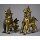 A Pair of Jewelled Brass Temple Lions with Enamelled Decoration, 12cm high (Some Loss to Jewels)