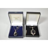 Two Silver, Jet and Marcasite Pendants with Silver Chains