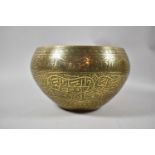 An Indian Brass Circular Bowl with Islamic Engraved Decoration, 28cm Diameter