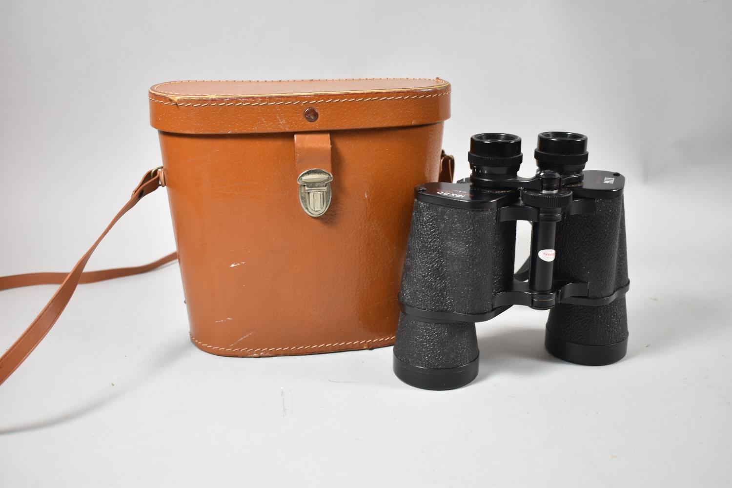 A Pair of Leather Cased King Binoculars, 12x50