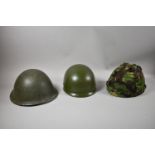 Two Military Helmets, a Toy Helmet and Thermometer