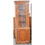 A Double Freestanding Corner Cabinet, 68cm wide