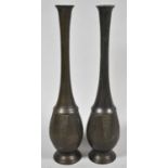 A Pair of Oriental Bronze Slender Vases, 24cm high