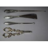 A Pair of Silver Plated Grape Scissors Together with Two Silver Mounted Button Hooks and a Silver