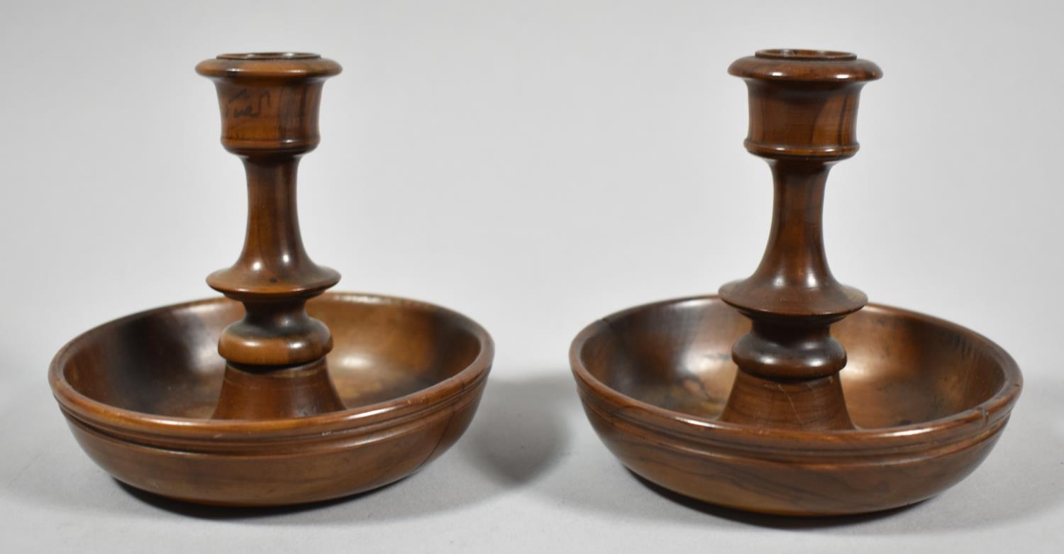 A Pair of Olive Wood Brighton Bun Travelling Candlesticks