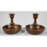 A Pair of Olive Wood Brighton Bun Travelling Candlesticks