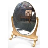 A Mid 20th Century Gilt Framed Oval Swing Dressing Table Mirror, 39cm wide