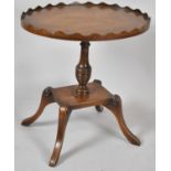 A Reproduction Crossbanded Mahogany and Walnut Oval Topped Occasional Table, 45cm wide