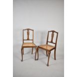 A Pair of Cane Seated Bedroom Chairs