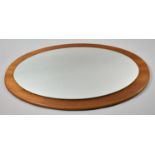 A 1970's Oval Wall Mirror, 57cm High